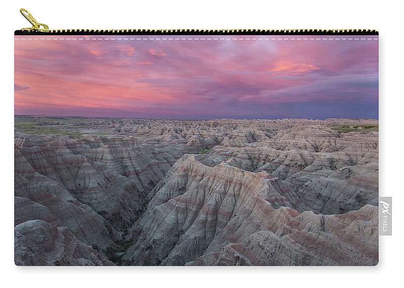 Badlands Zip Pouch featuring the photograph Badlands Sunrise by Eilish Palmer