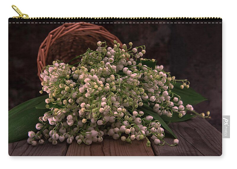 Basket Zip Pouch featuring the photograph Basket of fresh lily of the valley flowers by Jaroslaw Blaminsky
