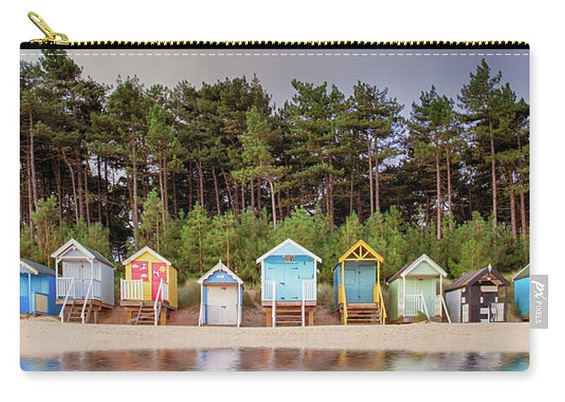 Wells Zip Pouch featuring the photograph Beach hut row on the Norfolk coast by Simon Bratt