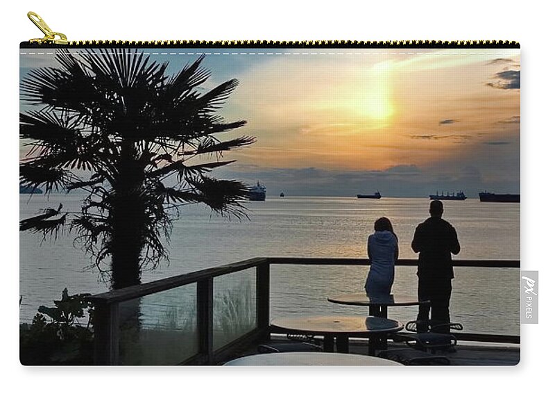 Alex Lyubar Zip Pouch featuring the photograph Beautiful sunset on the waterfront. by Alex Lyubar