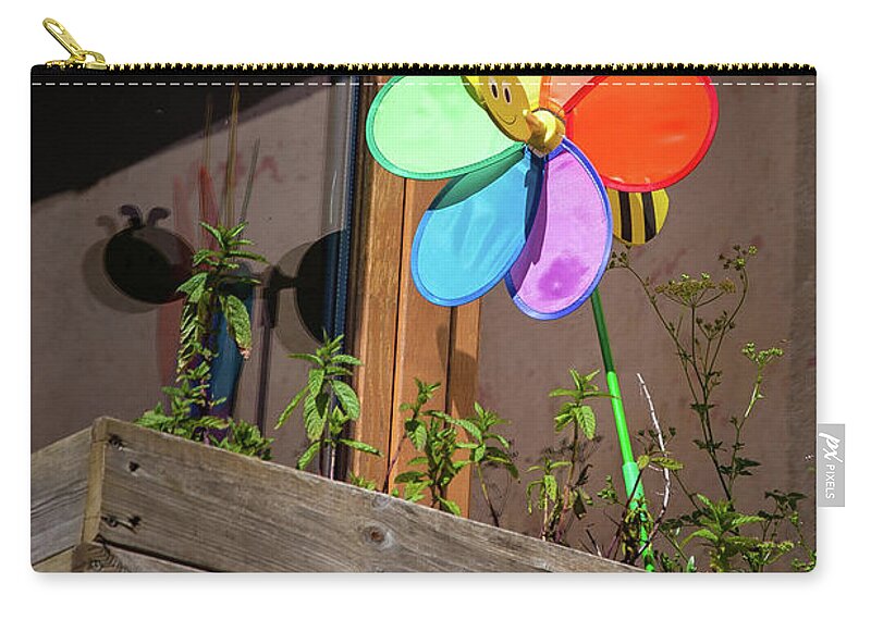 Buildings & Structures Zip Pouch featuring the photograph Bee a Wind Spinner? by Geoff Smith