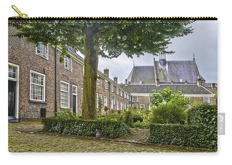 Begijnhof Zip Pouch featuring the photograph Begijnhof in Breda by Frans Blok