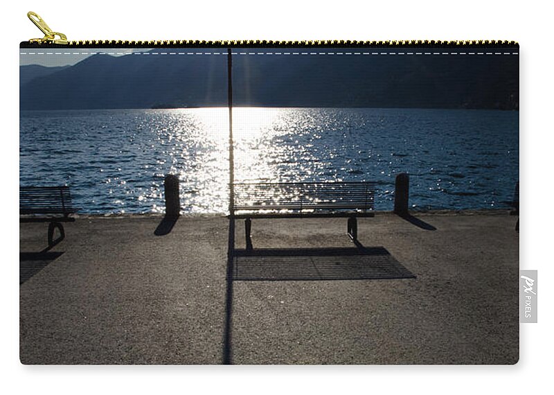 Bench Zip Pouch featuring the photograph Bench and street lamp by Mats Silvan