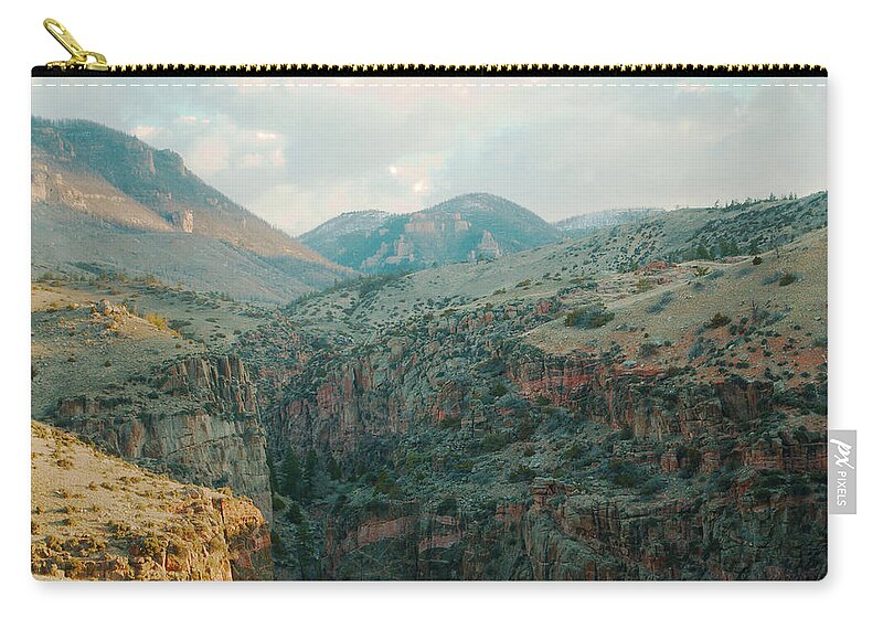 Bighorn Zip Pouch featuring the photograph Bighorn National Forest by Troy Stapek