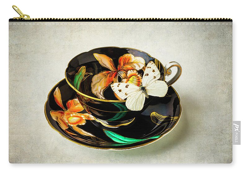 Colorful Zip Pouch featuring the photograph Black tea Cup And White Butterfly by Garry Gay
