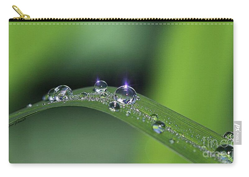 Droplets Zip Pouch featuring the photograph Blue light on the Droplets by Yumi Johnson