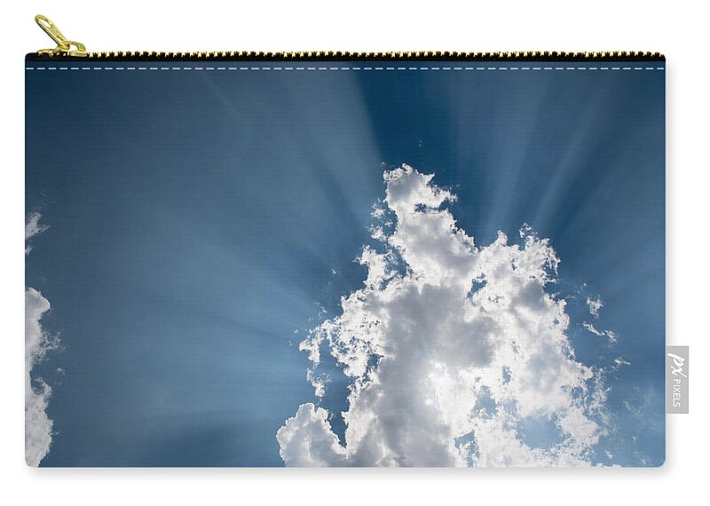 Atmosphere Carry-all Pouch featuring the photograph Blue sky with white clouds and sun rays by Michalakis Ppalis