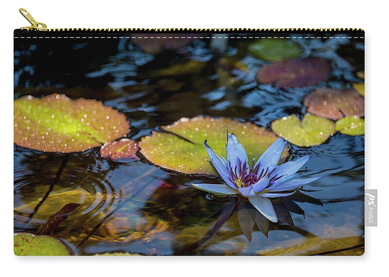Blue Water Lily Flower Pond Zip Pouch featuring the photograph Blue Water Lily Pond by Brian Harig