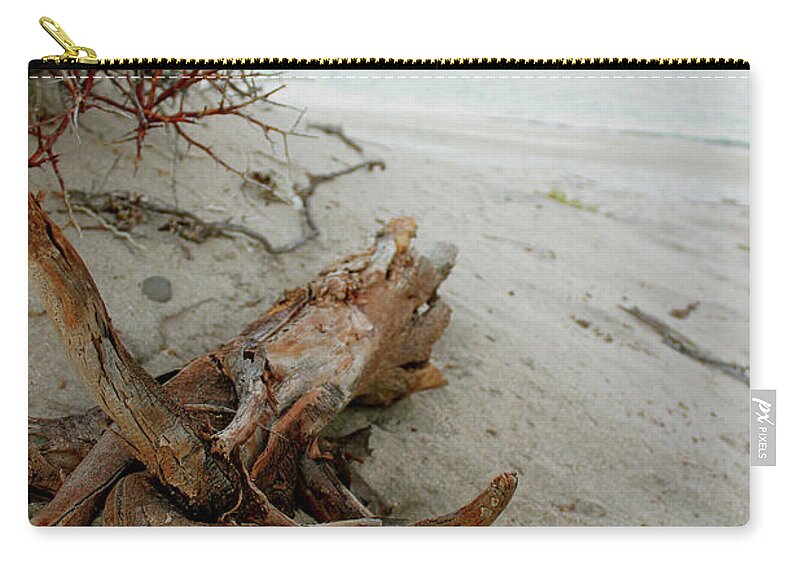 Driftwood Zip Pouch featuring the photograph Bonanza Beach Driftwood by Becqi Sherman