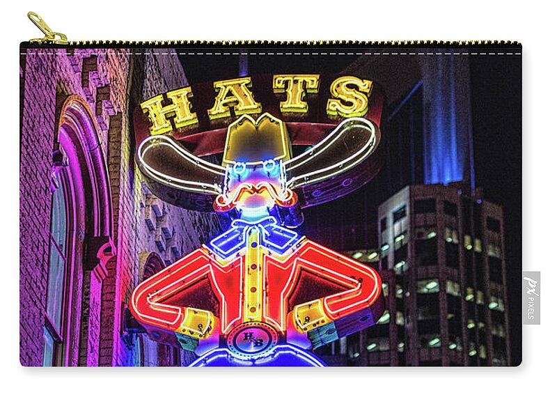 Boots And Hats Neon Sign Zip Pouch featuring the photograph Boots and Hat Neon Sign by Josh Bryant