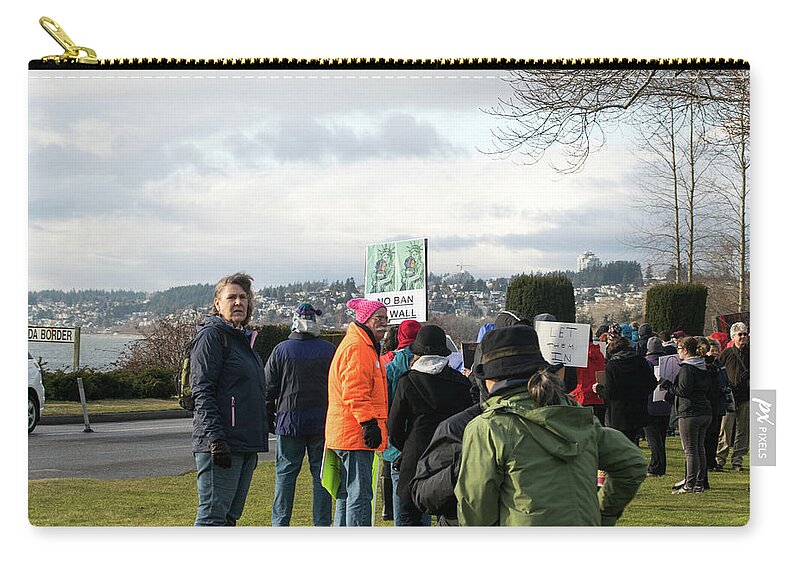 Protestors Zip Pouch featuring the photograph Border Protestors by Tom Cochran