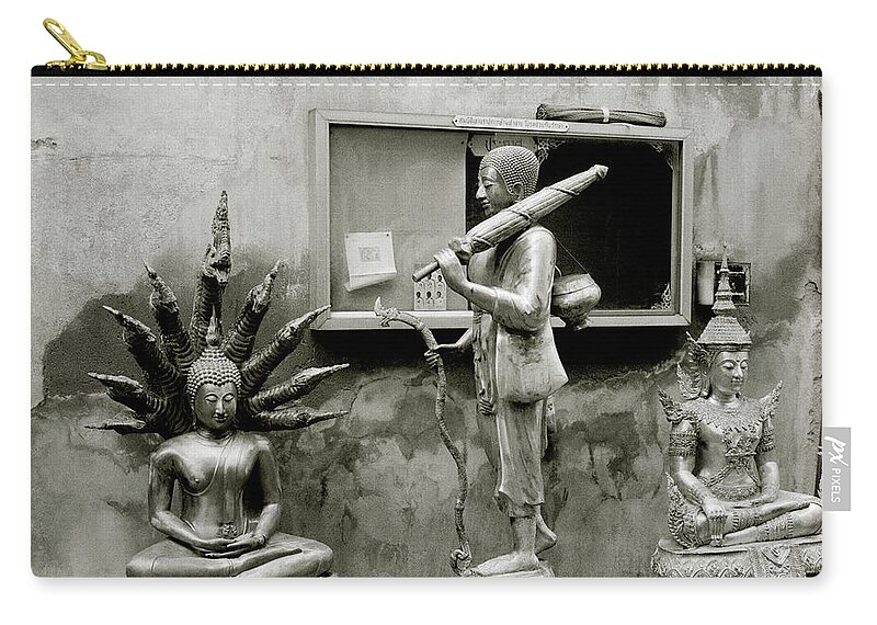 Buddha Zip Pouch featuring the photograph Buddha In The Streets Of Bangkok by Shaun Higson