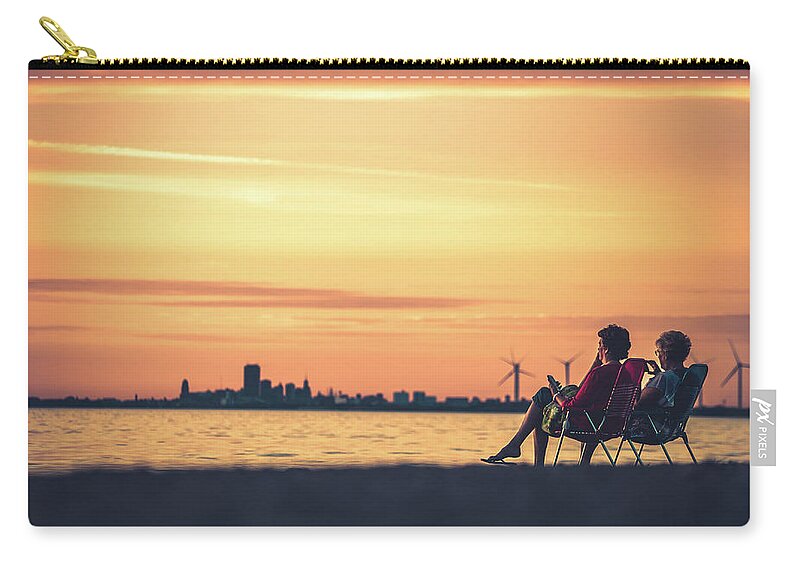Hamburg Zip Pouch featuring the photograph Buffalo, NY Sunset by Dave Niedbala