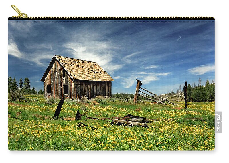 Rustic Zip Pouch featuring the photograph Cabin In A Field Of Flowers by James Eddy