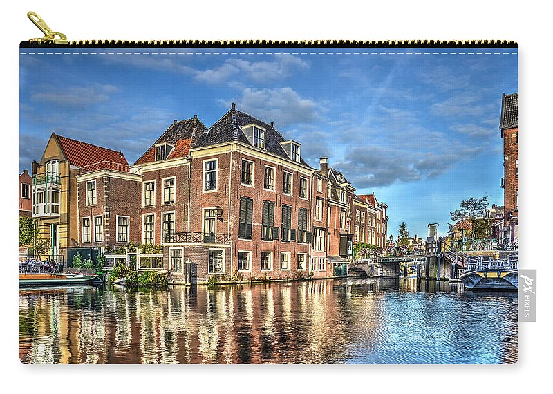 Canal Zip Pouch featuring the photograph Canalside Living in Leiden by Frans Blok