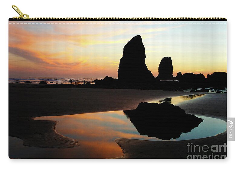 Cannon Beach Zip Pouch featuring the photograph Cannon Beach Sunset by Bob Christopher