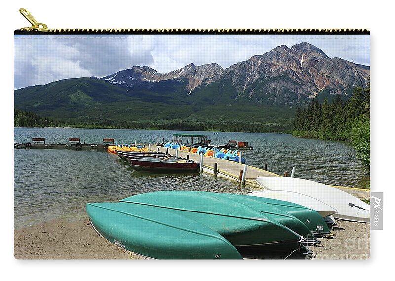 Canada Zip Pouch featuring the photograph Canoes At Pyramid Lake by Christiane Schulze Art And Photography
