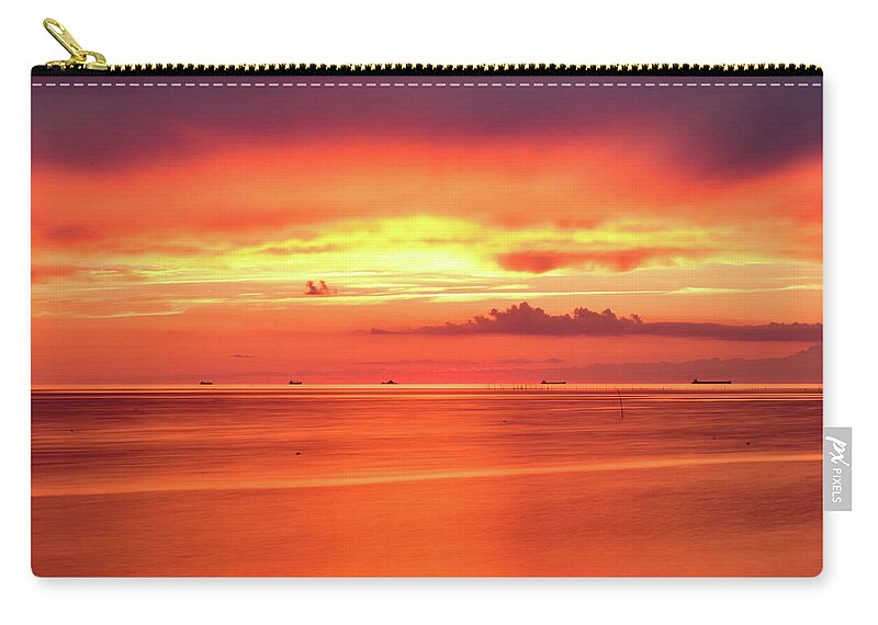 Sunset Carry-all Pouch featuring the photograph Cargo Line by Nicole Lloyd