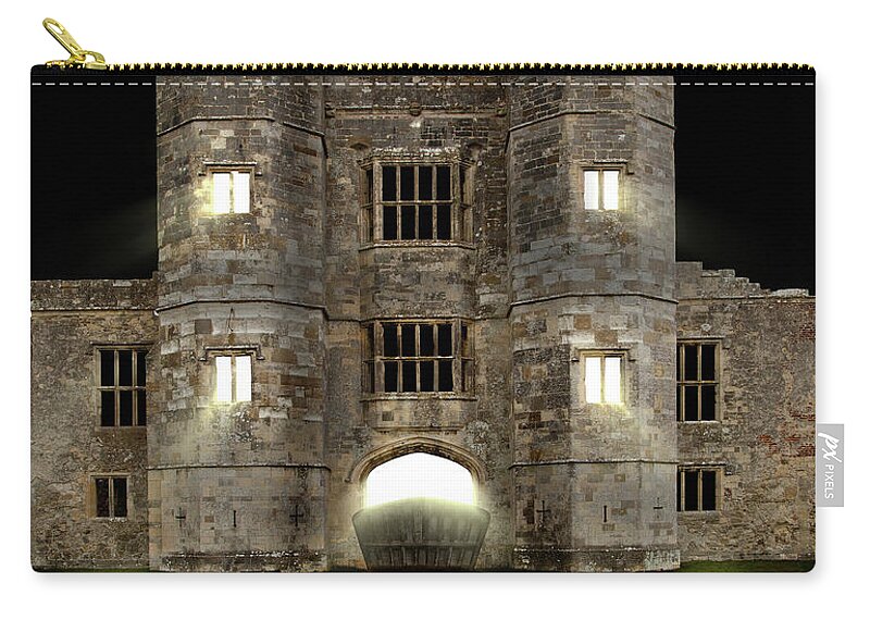 Darkness Zip Pouch featuring the photograph Castle at night with moat and lights glowing by Simon Bratt
