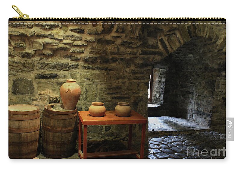 Donegal On Your Wall Zip Pouch featuring the photograph Donegal Castle Interior with Barrels and Pots by Eddie Barron