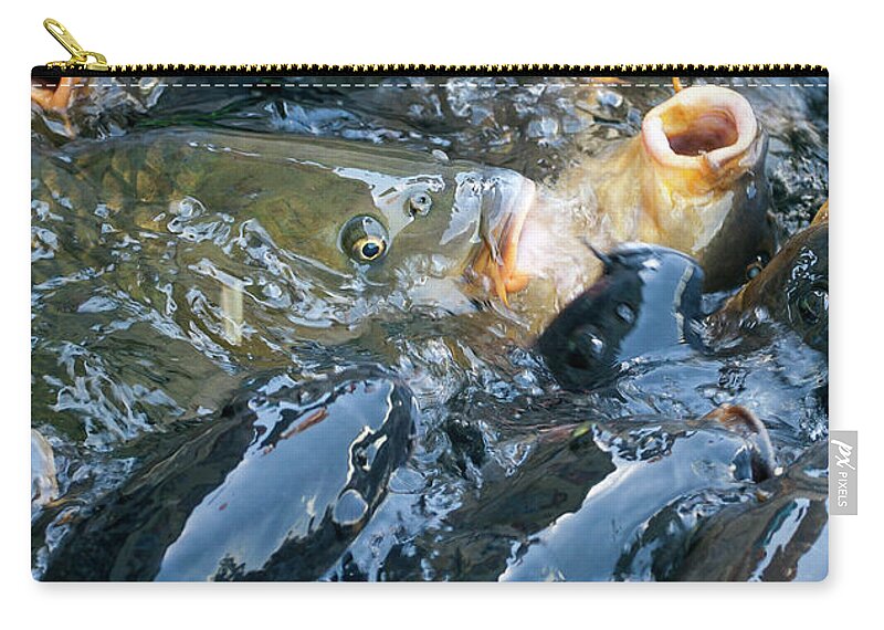 Crowds Zip Pouch featuring the photograph Caught in the Masses by Anthony Jones