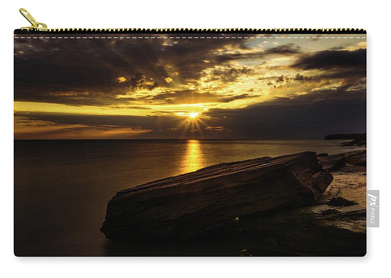 Bluffs By The Ocean Zip Pouch featuring the photograph Cavendish Sunrise Behind Passing Storm Clouds by Chris Bordeleau