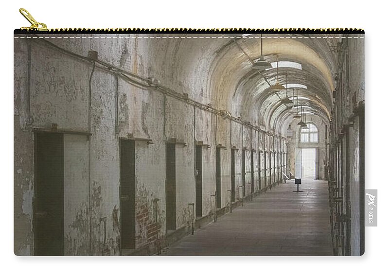 Eastern State Penitentiary Carry-all Pouch featuring the photograph Cellblock Hallway by Tom Singleton