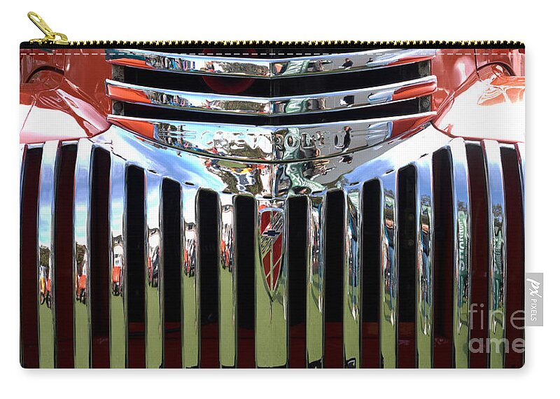 Chrome Zip Pouch featuring the photograph Chevrolet Grille 01 by Rick Piper Photography