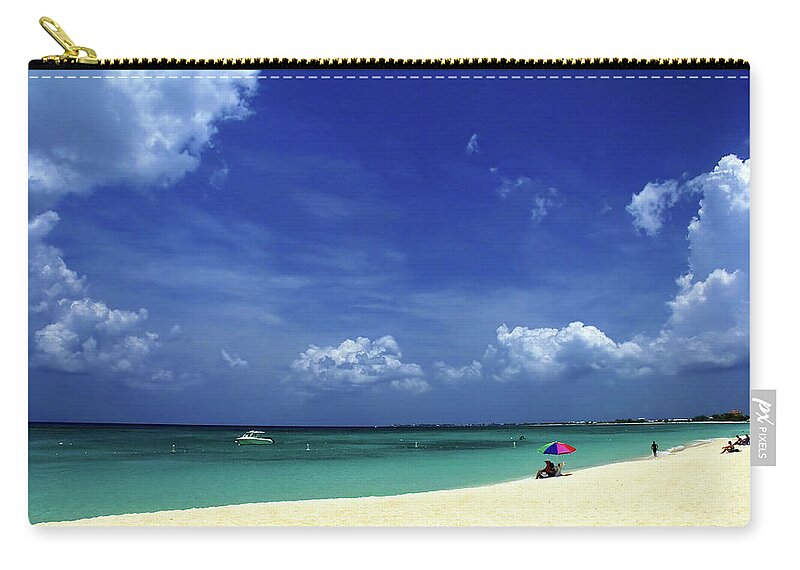 Grand Zip Pouch featuring the photograph Circle of Clouds on Grand Cayman by Marie Hicks