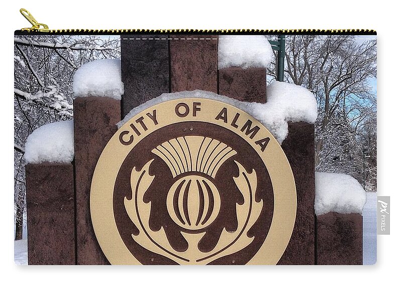 Alma Zip Pouch featuring the photograph City of Alma Michigan Snow by Chris Brown