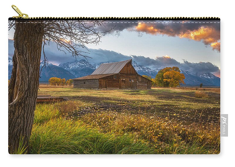 Sunset Zip Pouch featuring the photograph Clearing Storm over Moulton Barn by Darren White