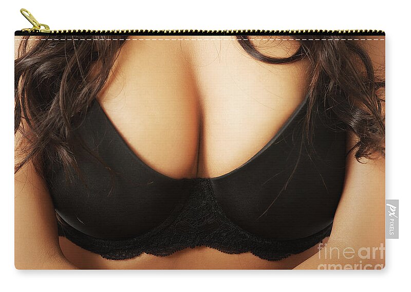 Close up on female boobs in black bra Zip Pouch