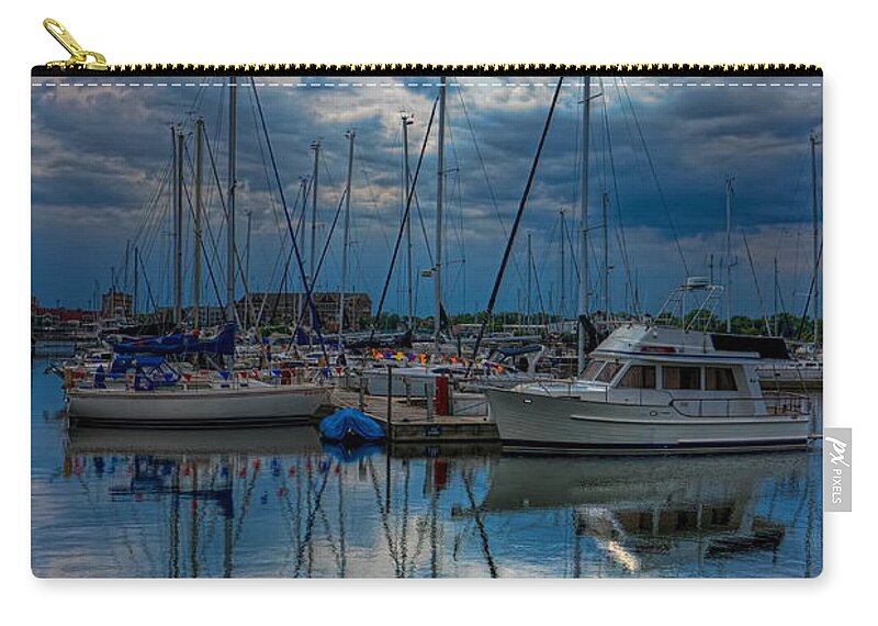 Weather Zip Pouch featuring the photograph Cloudy Afternoon at Reefpoint Marina by Dale Kauzlaric
