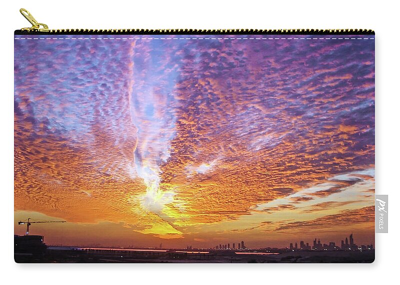 Clouds Zip Pouch featuring the photograph Cloudy Sunset by Peggy Blackwell