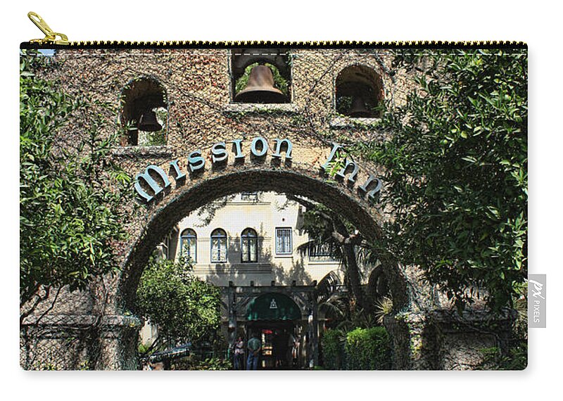 Mission Inn Zip Pouch featuring the photograph Coach Entrance by Tommy Anderson