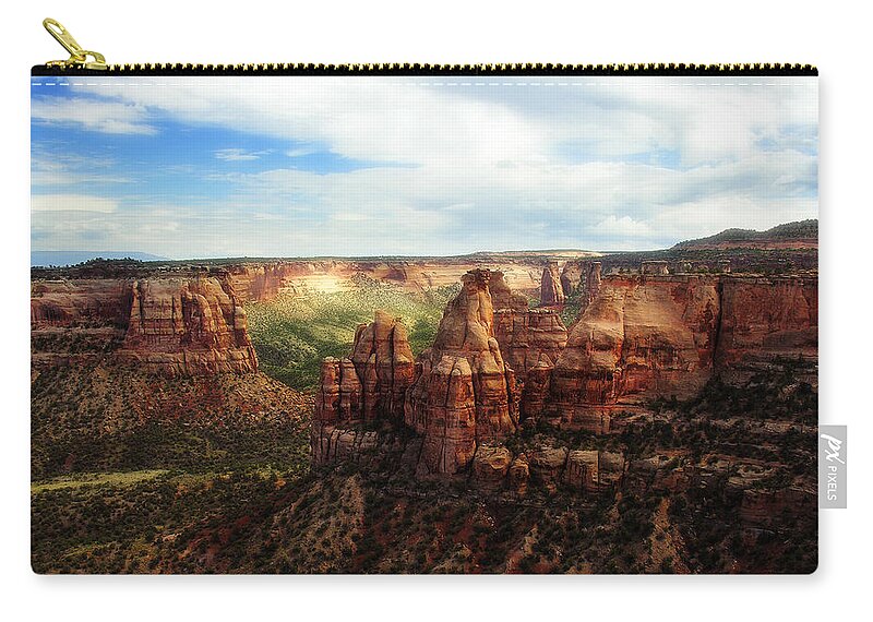 Americana Zip Pouch featuring the photograph Colorado National Monument by Marilyn Hunt