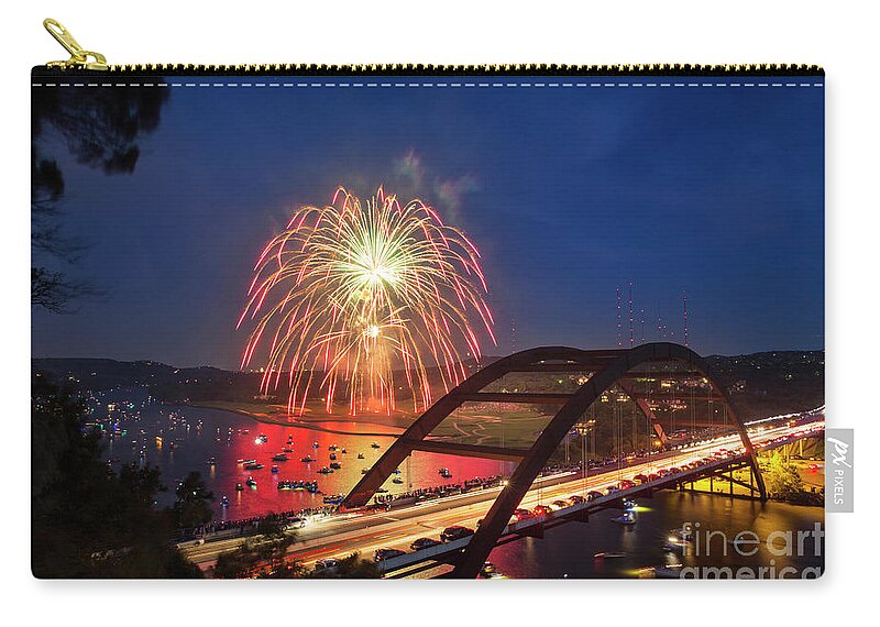 Fireworks Zip Pouch featuring the photograph Colorful 4th of July fireworks paint the night sky over the 360 by Dan Herron