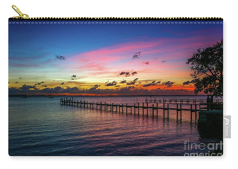 Sun Zip Pouch featuring the photograph Colorful Lagoon Sunrise by Tom Claud