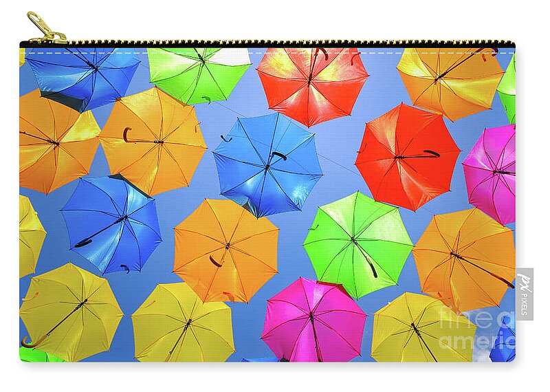 Umbrellas Carry-all Pouch featuring the photograph Colorful Umbrellas I by Raul Rodriguez