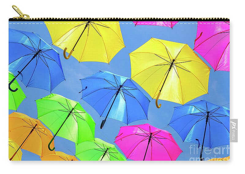 Umbrellas Carry-all Pouch featuring the photograph Colorful Umbrellas III by Raul Rodriguez