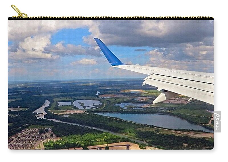 Atmosphere Zip Pouch featuring the photograph Coming In For A Landing In #austin by Austin Tuxedo Cat