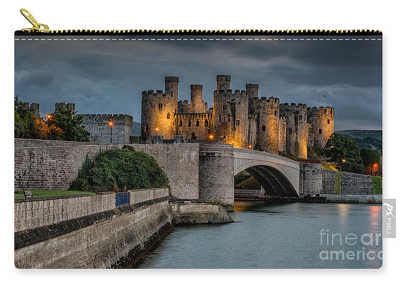 Conwy Castle Zip Pouch featuring the photograph Conwy Castle by Lamplight by Adrian Evans