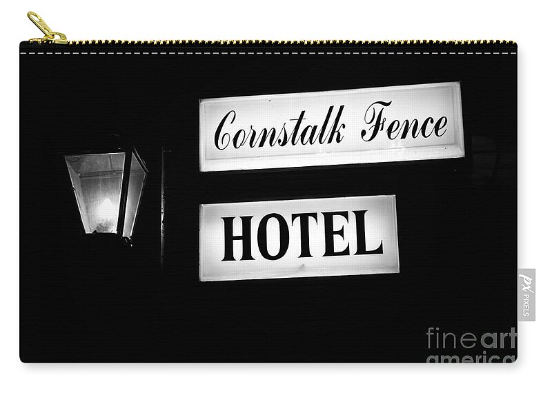 New Orleans Zip Pouch featuring the photograph Cornstalk Fence Hotel by Leslie Leda