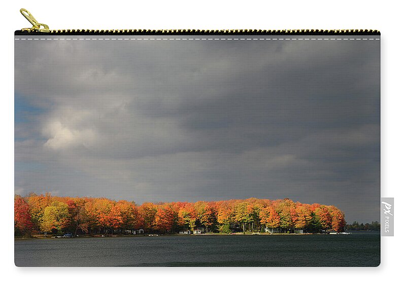 Cottages Zip Pouch featuring the photograph Cottages on Lake Eugenia with red sidelit maple trees and storm by Reimar Gaertner