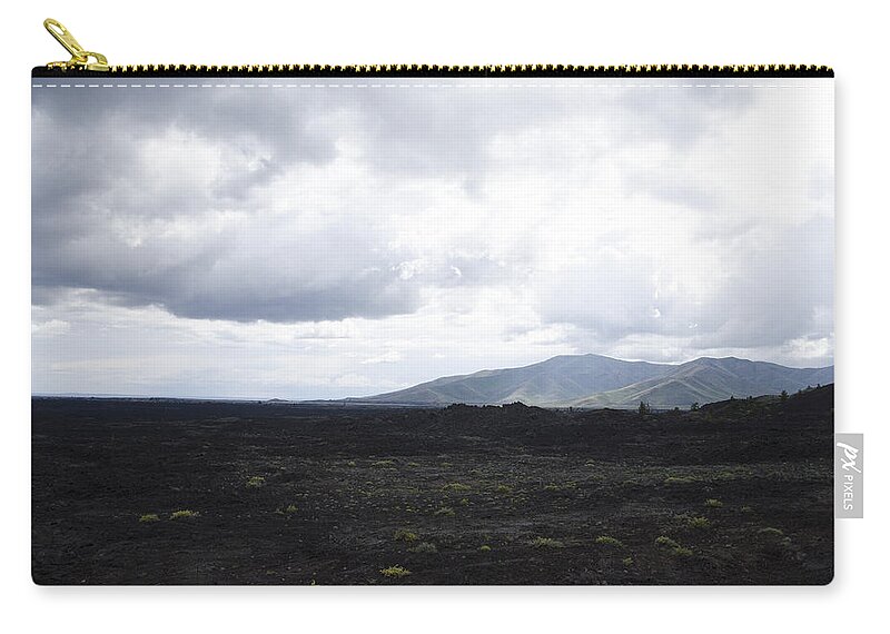 Craters Of The Moon Zip Pouch featuring the photograph Craters of the Moon by Erik Burg