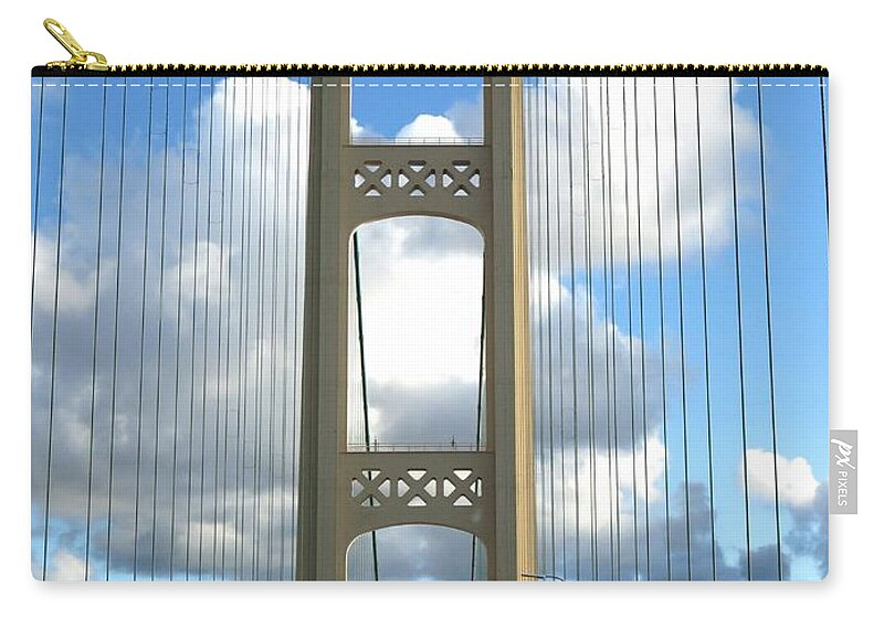 Bridge Zip Pouch featuring the photograph Crossing The Mighty Mac by Keith Stokes