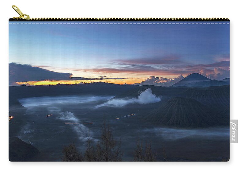 Landscape Zip Pouch featuring the photograph Dawn breaking scene of Mt Bromo by Pradeep Raja Prints