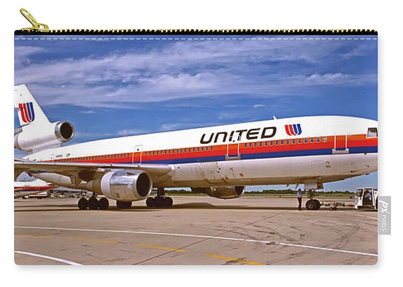Dc10-30 Zip Pouch featuring the photograph dc10-30 Chicago OHare international by Tom Jelen