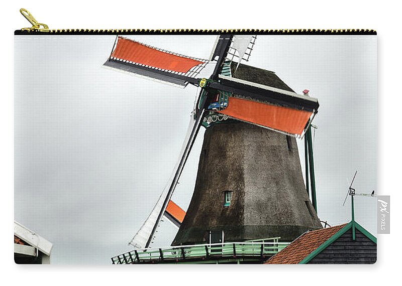Europe Zip Pouch featuring the photograph De Kat windmill in Zaanse Schans by RicardMN Photography