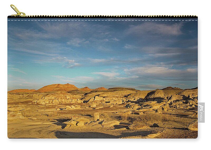 Bisti Badlands Zip Pouch featuring the photograph De Na Zin wilderness sunset by Kunal Mehra
